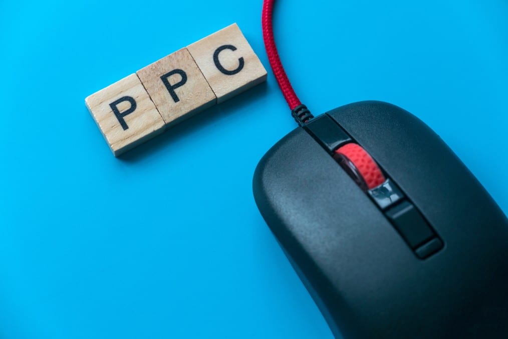 How does a PPC management service help businesses